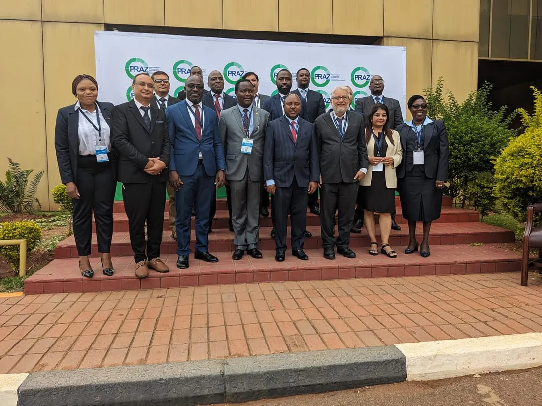 A group of officials at a public-institution convening.